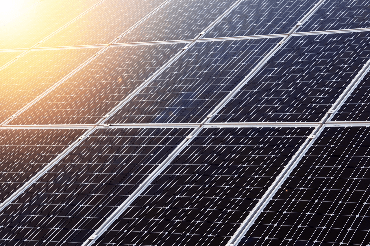 Solar panels under blue sky
